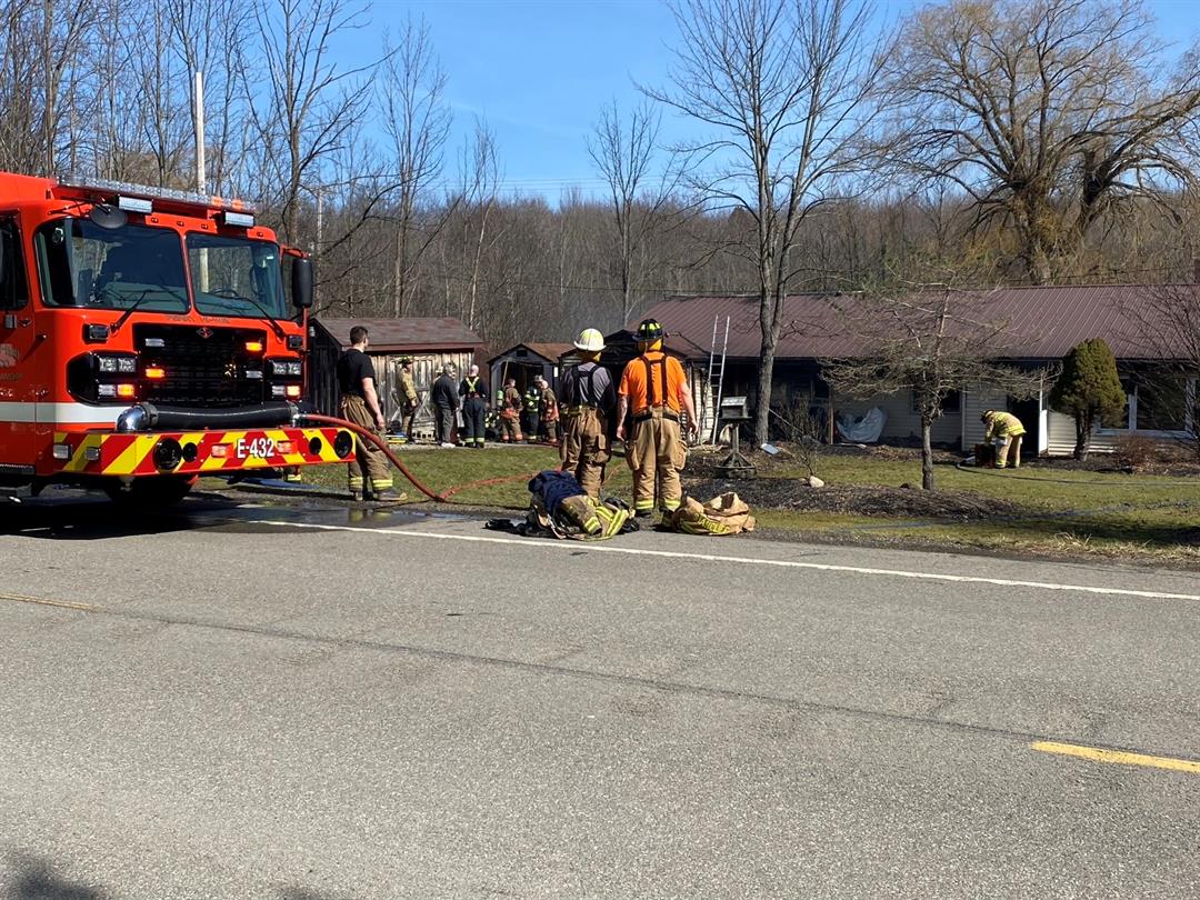 Pair Rescue Woman from House Fire in Summit Township